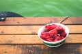 Summer refreshment cold sliced Ã¢â¬â¹Ã¢â¬â¹watermelon in a bowl on woo